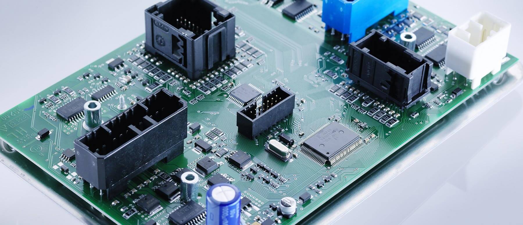 Close-up of an electronic circuit board with connectors and components