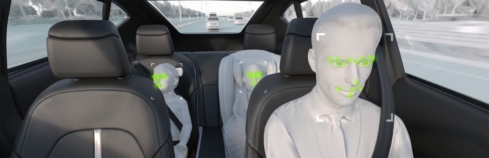 People in a vehicle with the driver monitoring system engaged