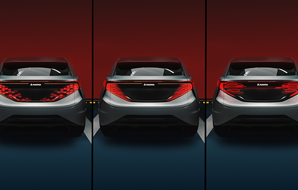 Three vehicles parked side by side with their tail lights showing