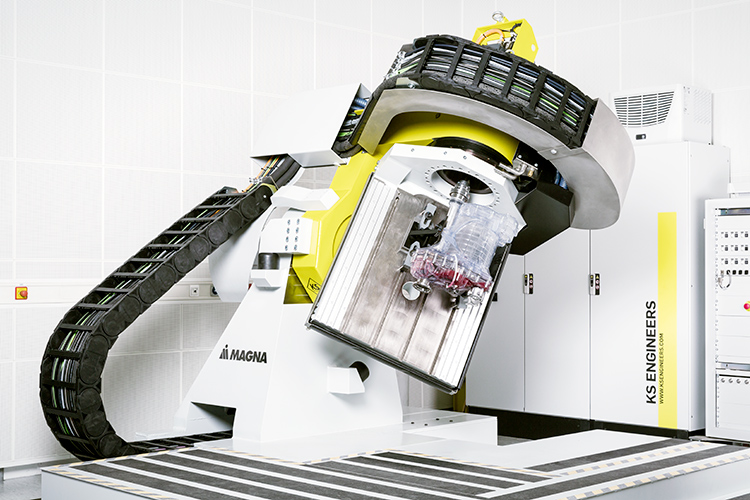 Rear view of grey vehicle taillights on with fog in background